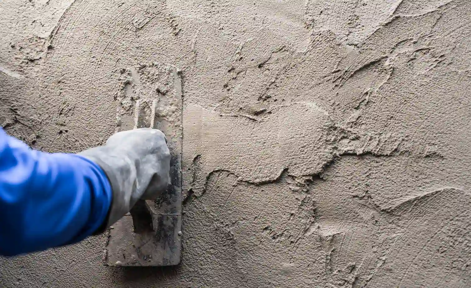 hand-plasterer-plastering-cement-wall-background-2025-01-09-08-18-06-utc